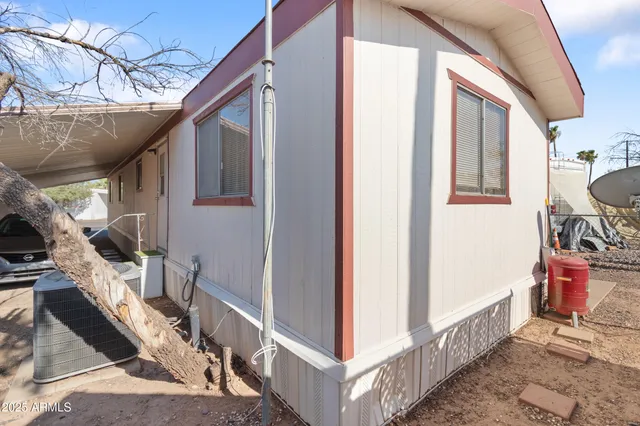 a view of a terrace with furniture and a flat screen tv