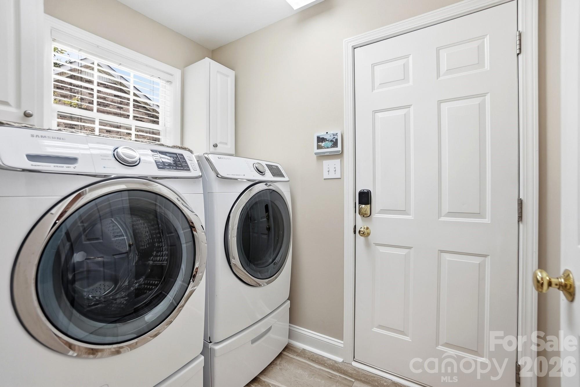 3324 Muddy Creek Road Midland, NC 28107 - Photo 25 of 46 a view of a hallway with washer and dryer
