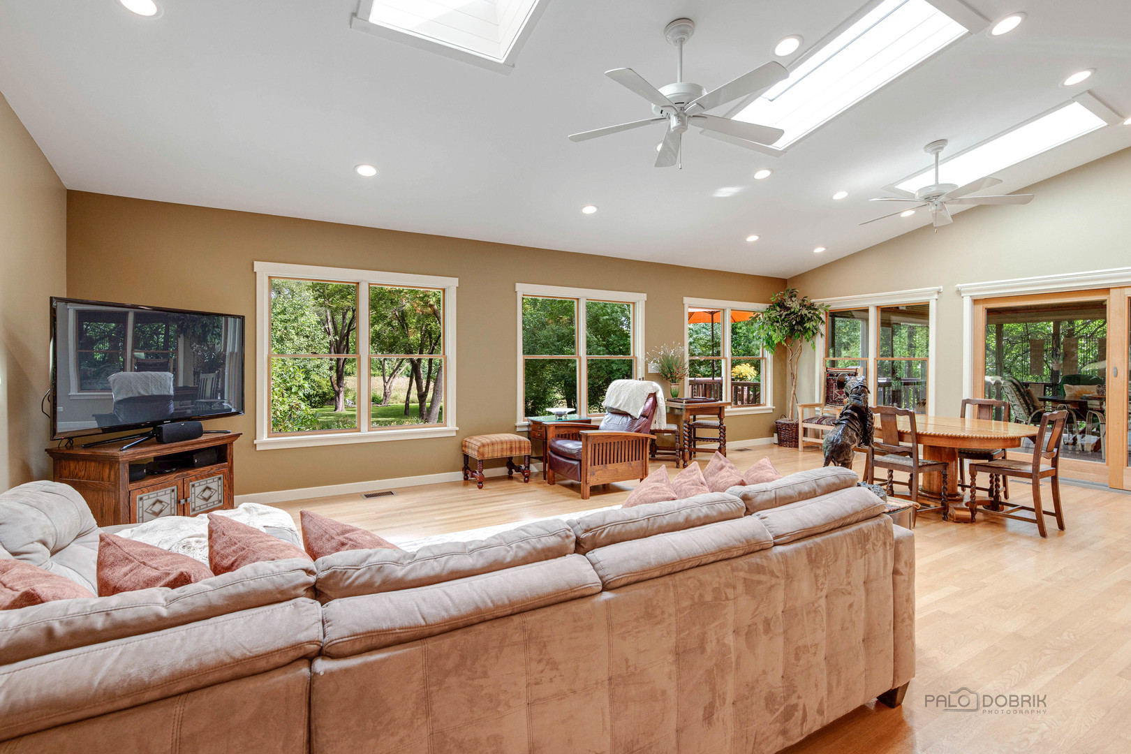 590 West Helen Road Palatine, IL 60067 - Photo 14 of 95 a living room with furniture and a flat screen tv