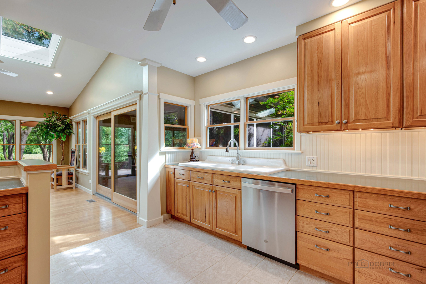 590 West Helen Road Palatine, IL 60067 - Photo 21 of 95 a large kitchen with kitchen island granite countertop a large window