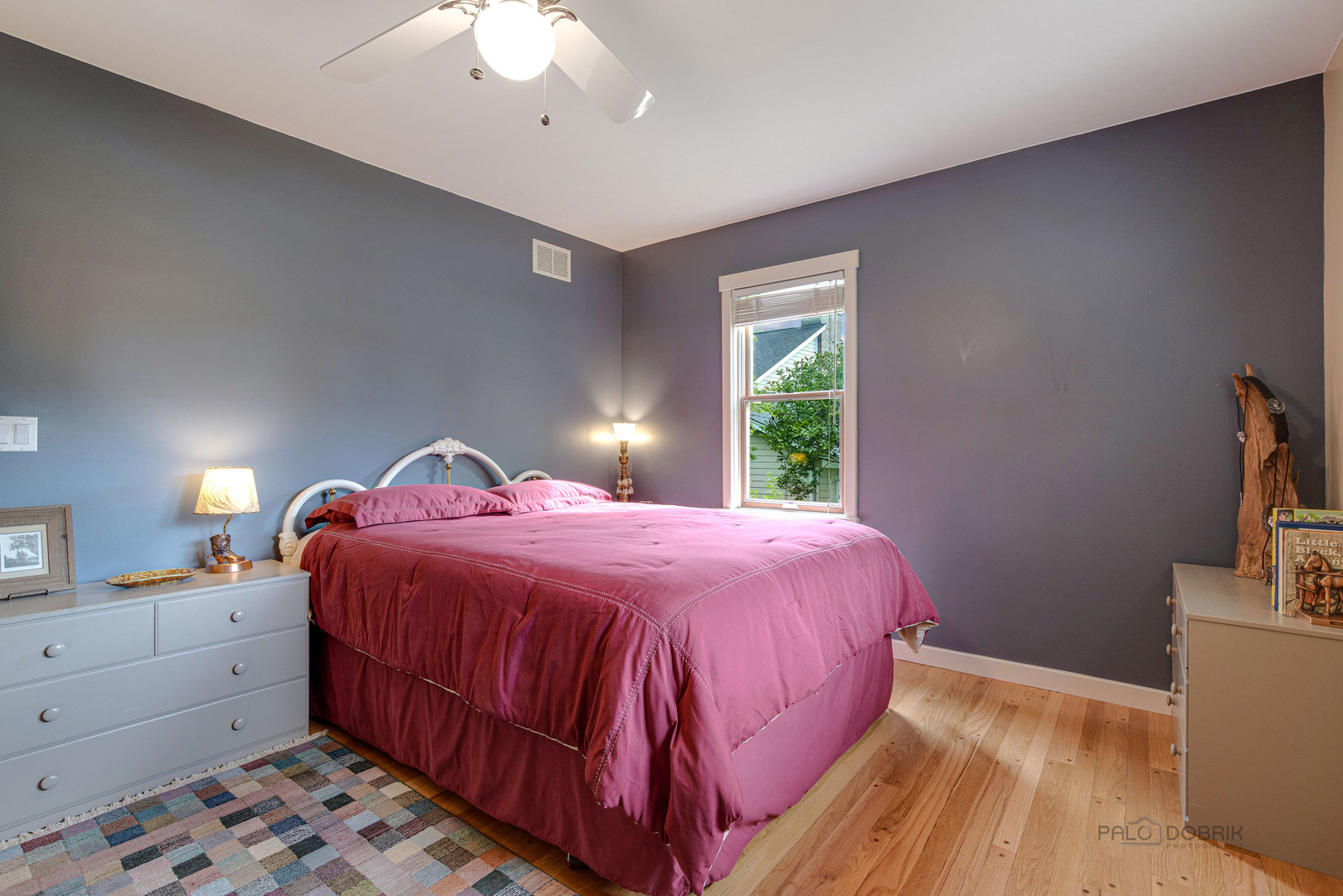 590 West Helen Road Palatine, IL 60067 - Photo 37 of 95 a bedroom with a bed and a potted plant