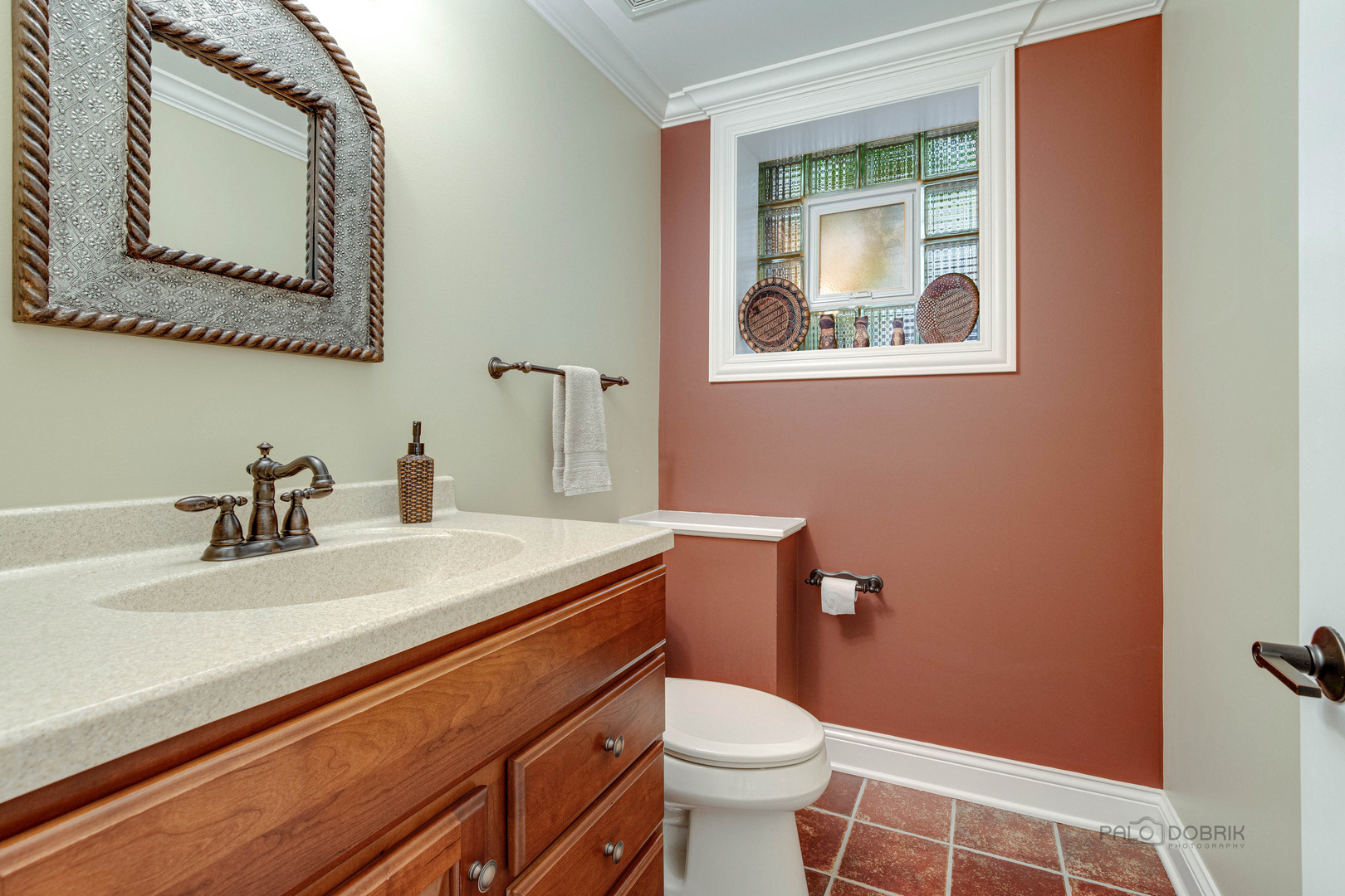 590 West Helen Road Palatine, IL 60067 - Photo 61 of 95 a bathroom with a toilet sink and mirror