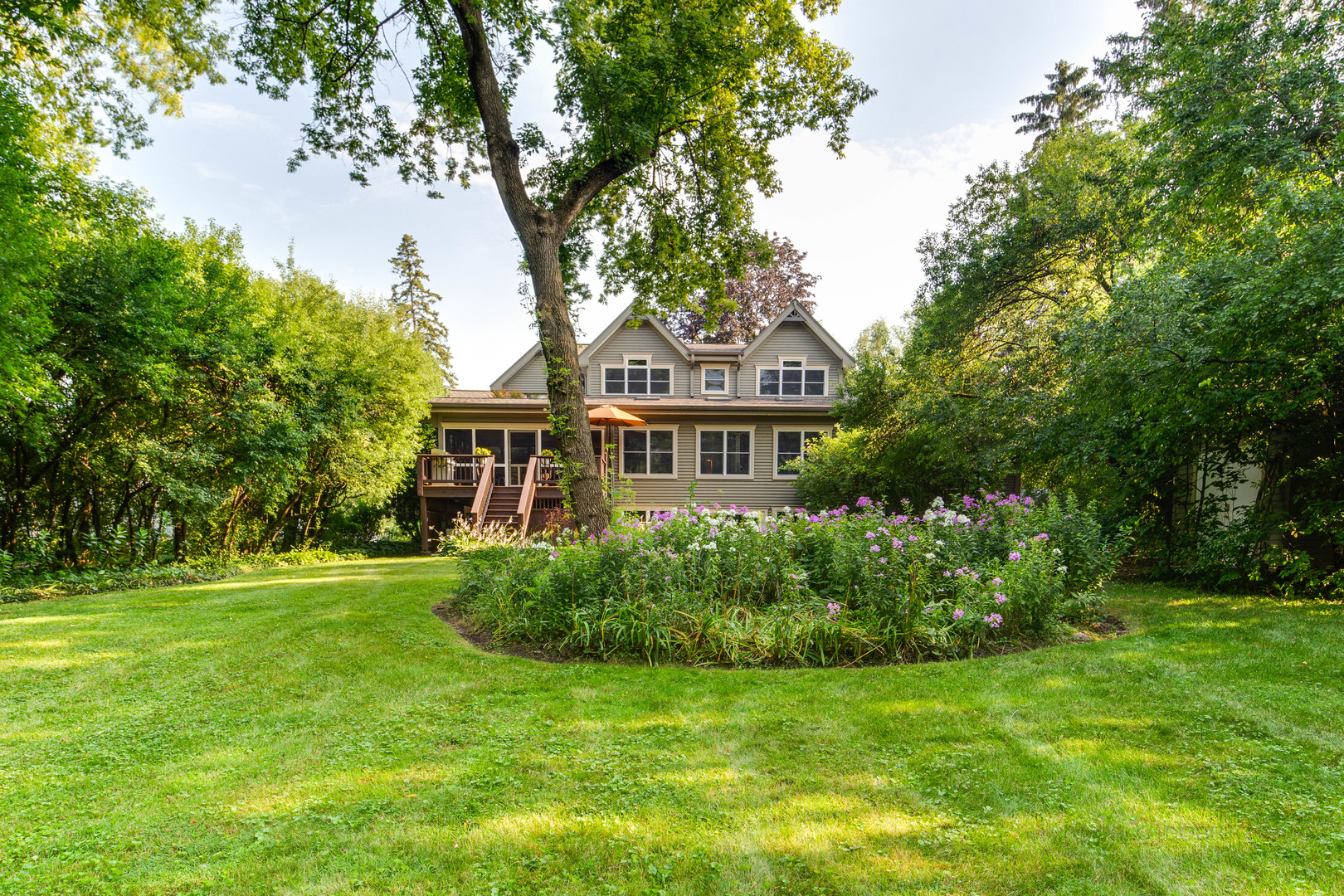 590 West Helen Road Palatine, IL 60067 - Photo 77 of 95 a front view of a house with a garden
