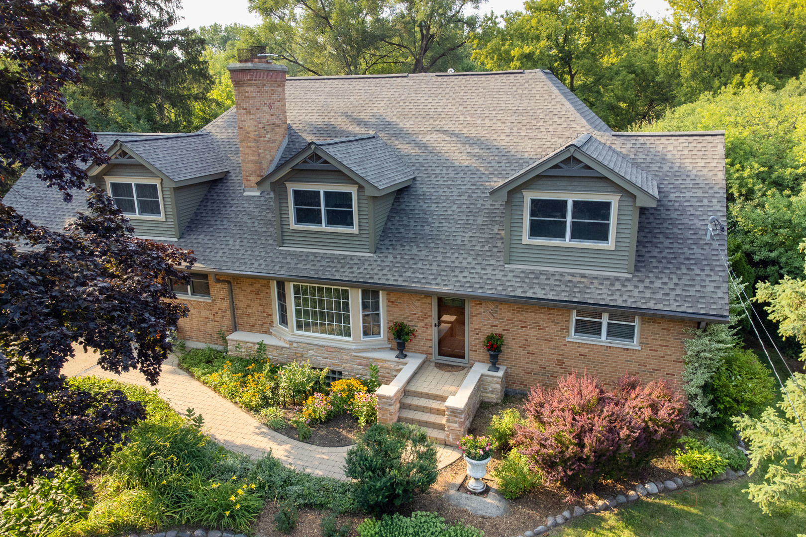 590 West Helen Road Palatine, IL 60067 - Photo 78 of 95 a aerial view of a house with a yard and potted plants