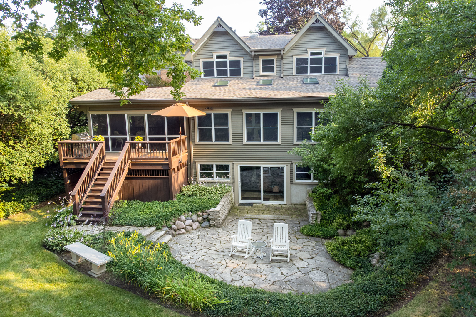 590 West Helen Road Palatine, IL 60067 - Photo 82 of 95 a front view of a house with a yard table and chairs