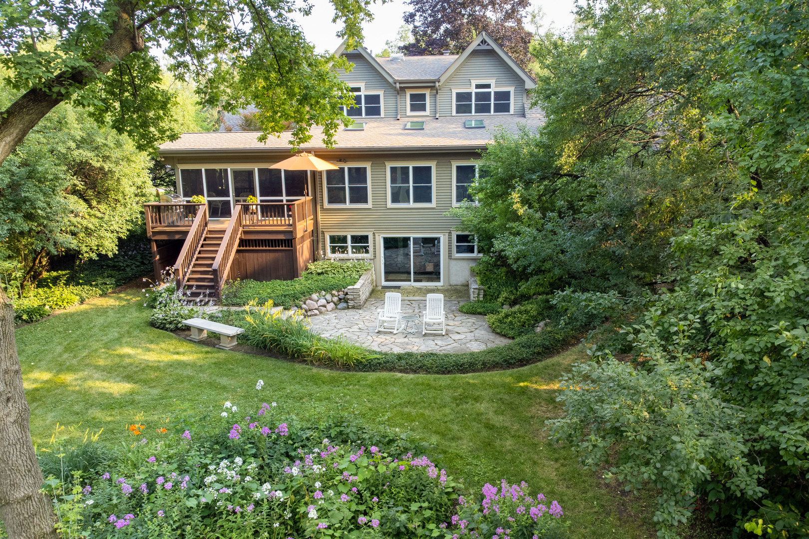 590 West Helen Road Palatine, IL 60067 - Photo 83 of 95 a front view of a house with a yard table and chairs