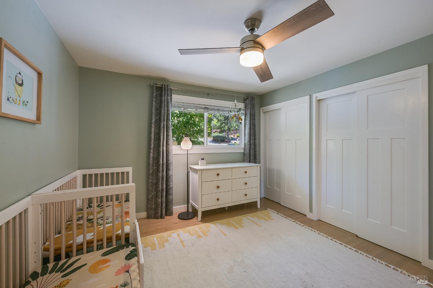 2009 Hidden Valley Drive Santa Rosa, CA 95404 - Photo 15 of 26 a bedroom with furniture and a window