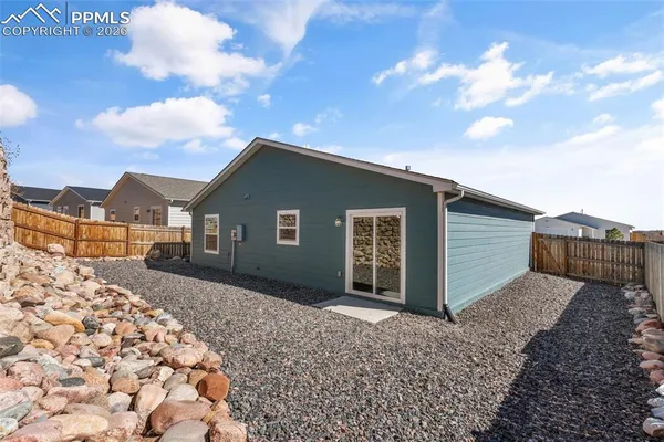 a house view with a backyard space