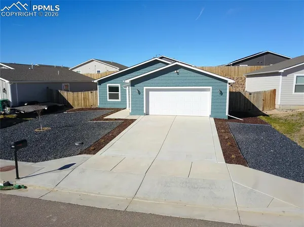 a house view with a outdoor space
