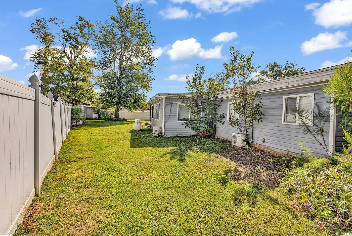 4 Plantation Road Myrtle Beach, SC 29588 - Photo 33 of 40 View of fenced backyard