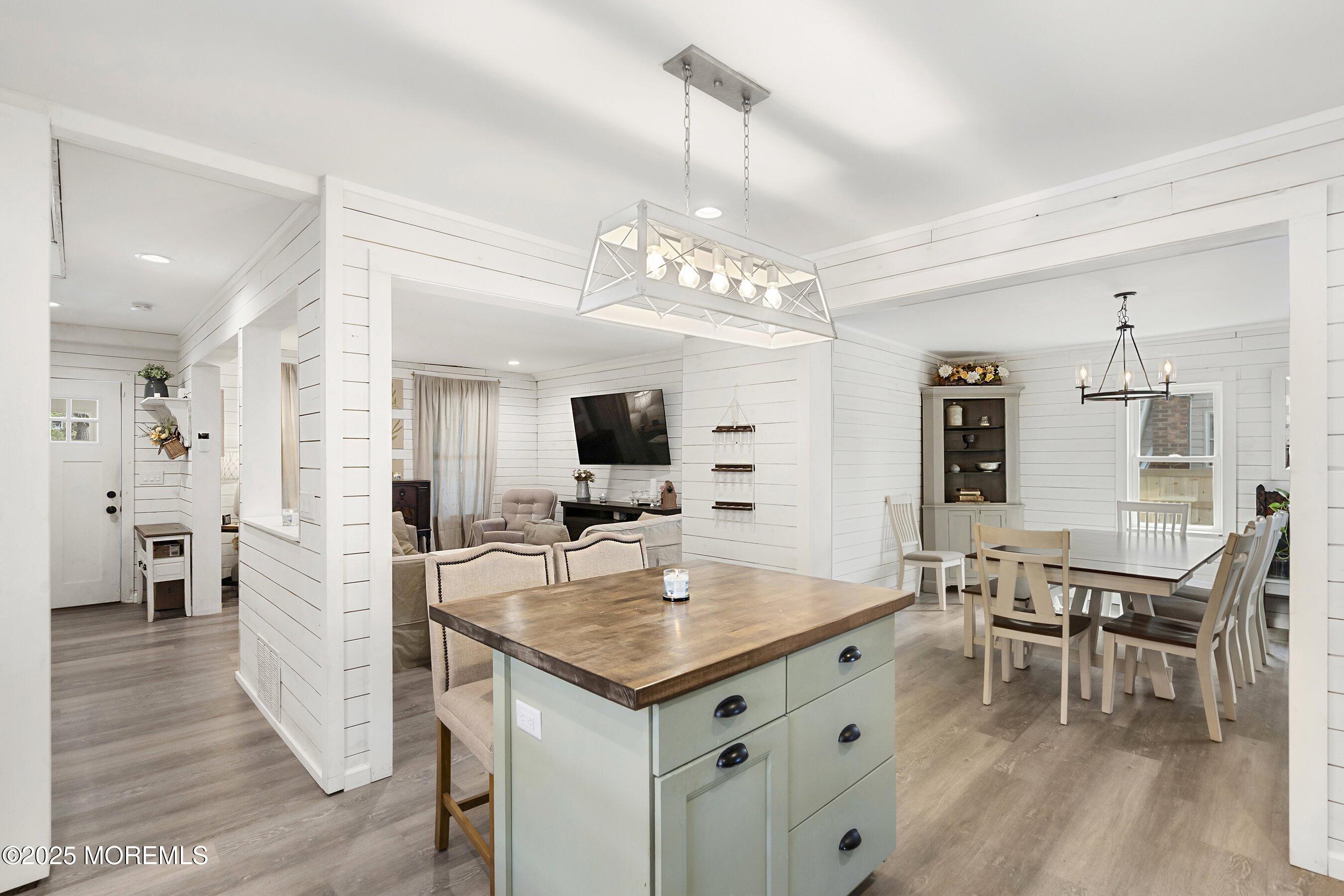 1030 Ocean Road Point Pleasant, NJ 08742 - Photo 12 of 45 a view of a kitchen area with furniture and wooden floor