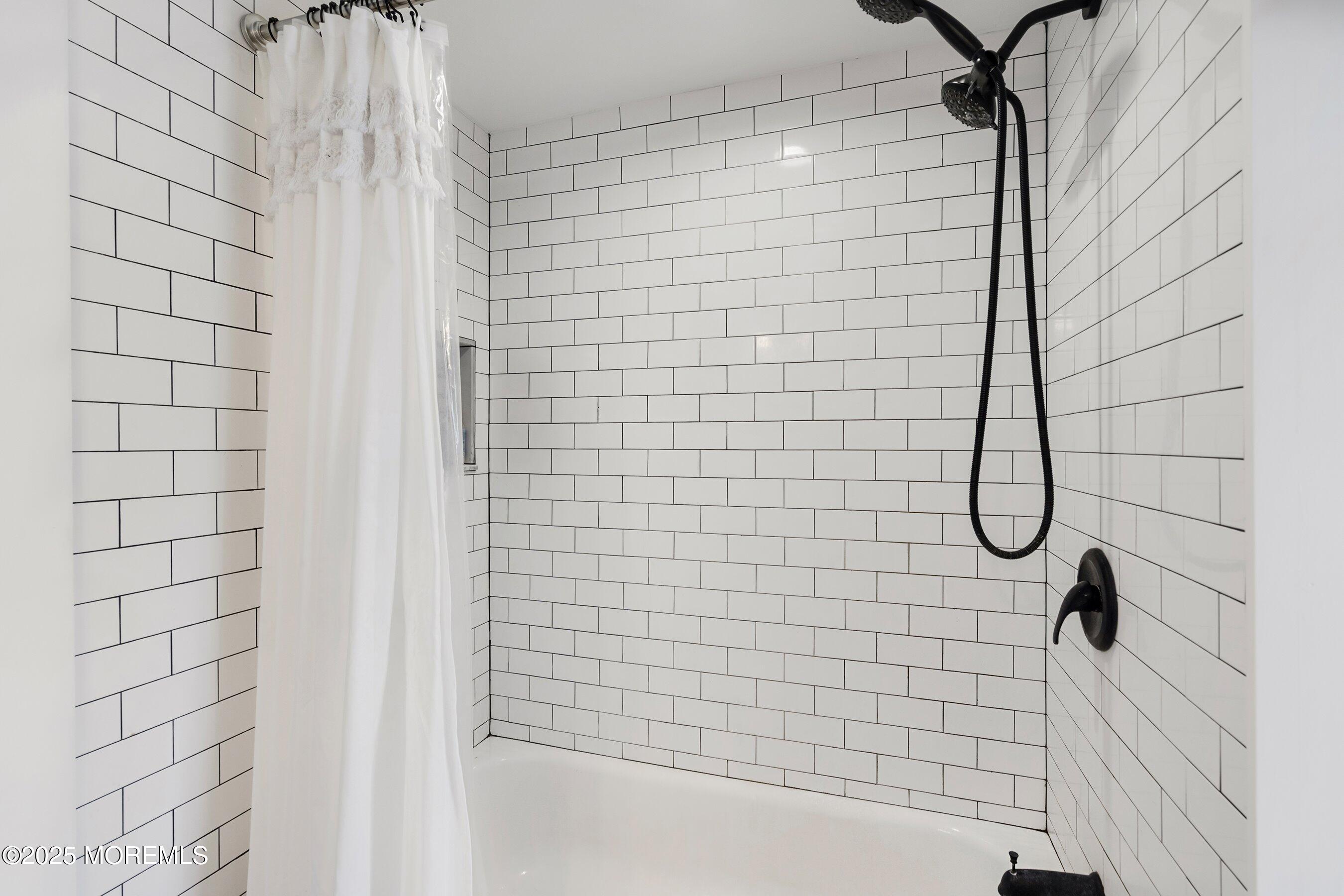 1030 Ocean Road Point Pleasant, NJ 08742 - Photo 17 of 45 a bathroom with a shower