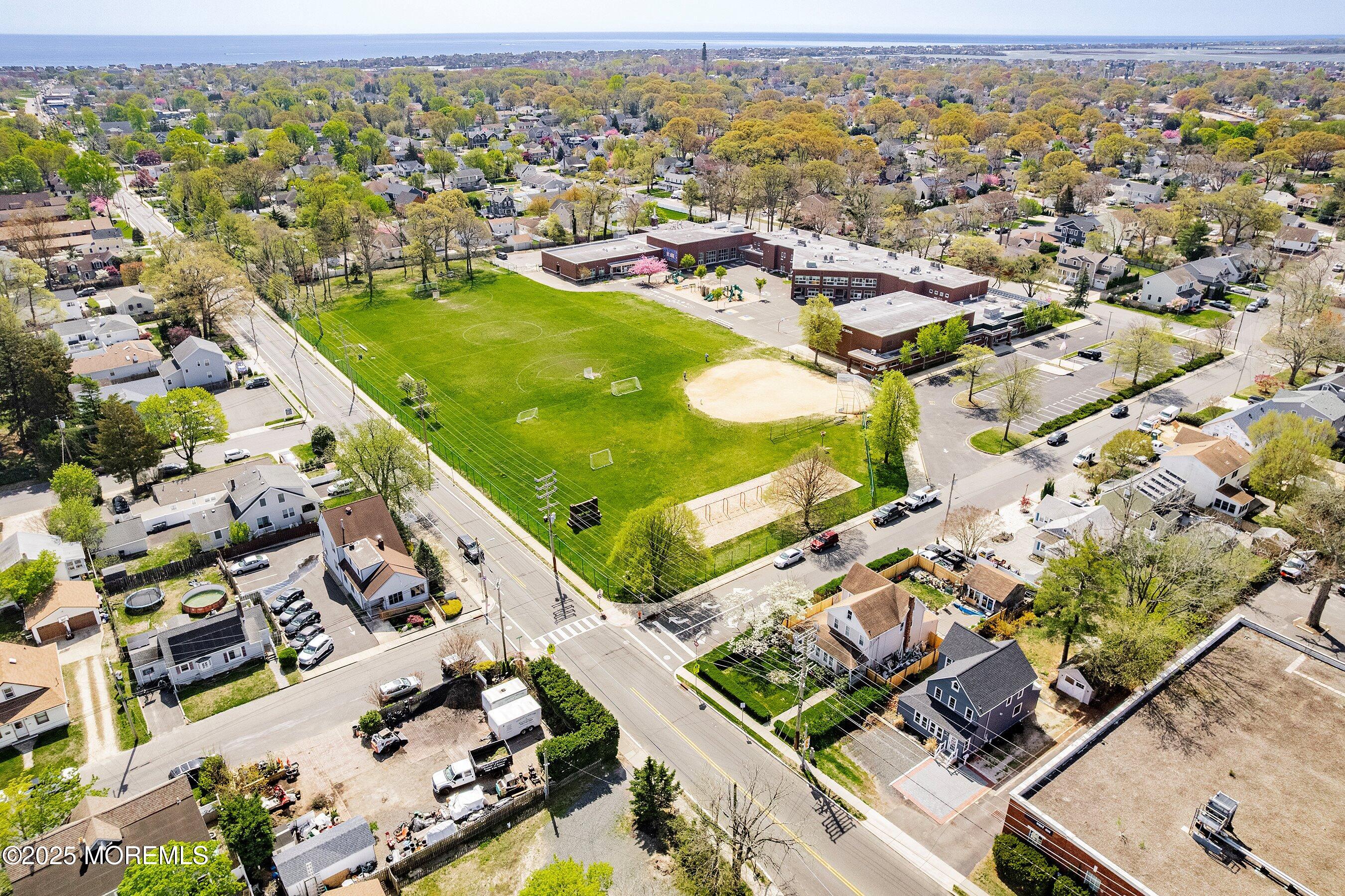 1030 Ocean Road Point Pleasant, NJ 08742 - Photo 24 of 45 an aerial view of residential houses with outdoor space
