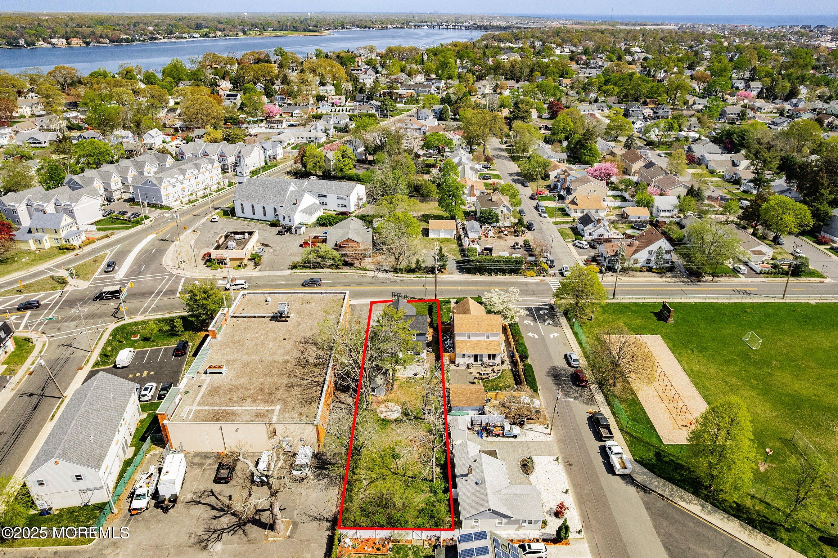 1030 Ocean Road Point Pleasant, NJ 08742 - Photo 29 of 45 an aerial view of residential houses with outdoor space