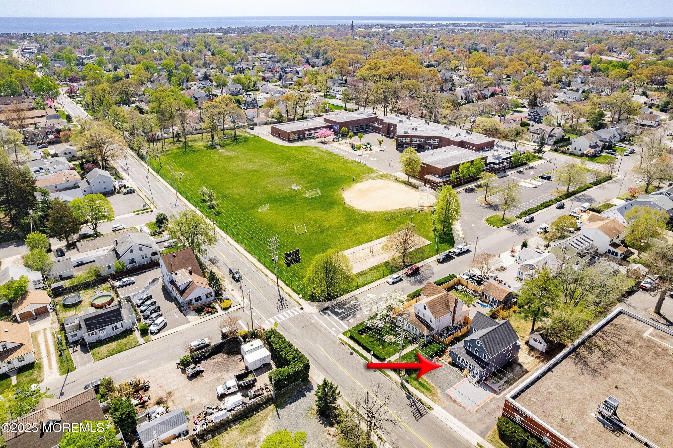 1030 Ocean Road Point Pleasant, NJ 08742 - Photo 3 of 45 an aerial view of residential houses with outdoor space