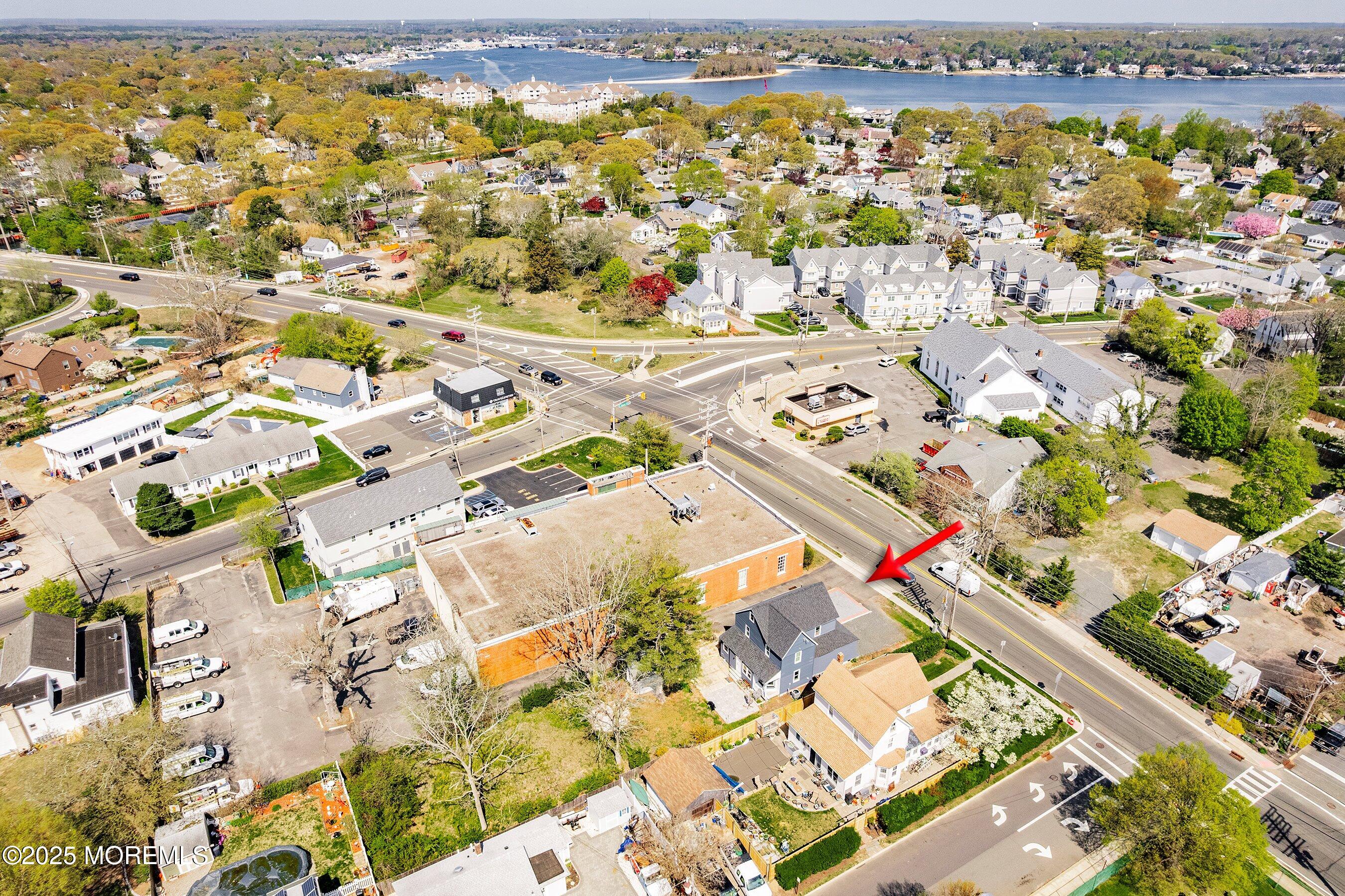 1030 Ocean Road Point Pleasant, NJ 08742 - Photo 31 of 45 an aerial view of residential houses with outdoor space