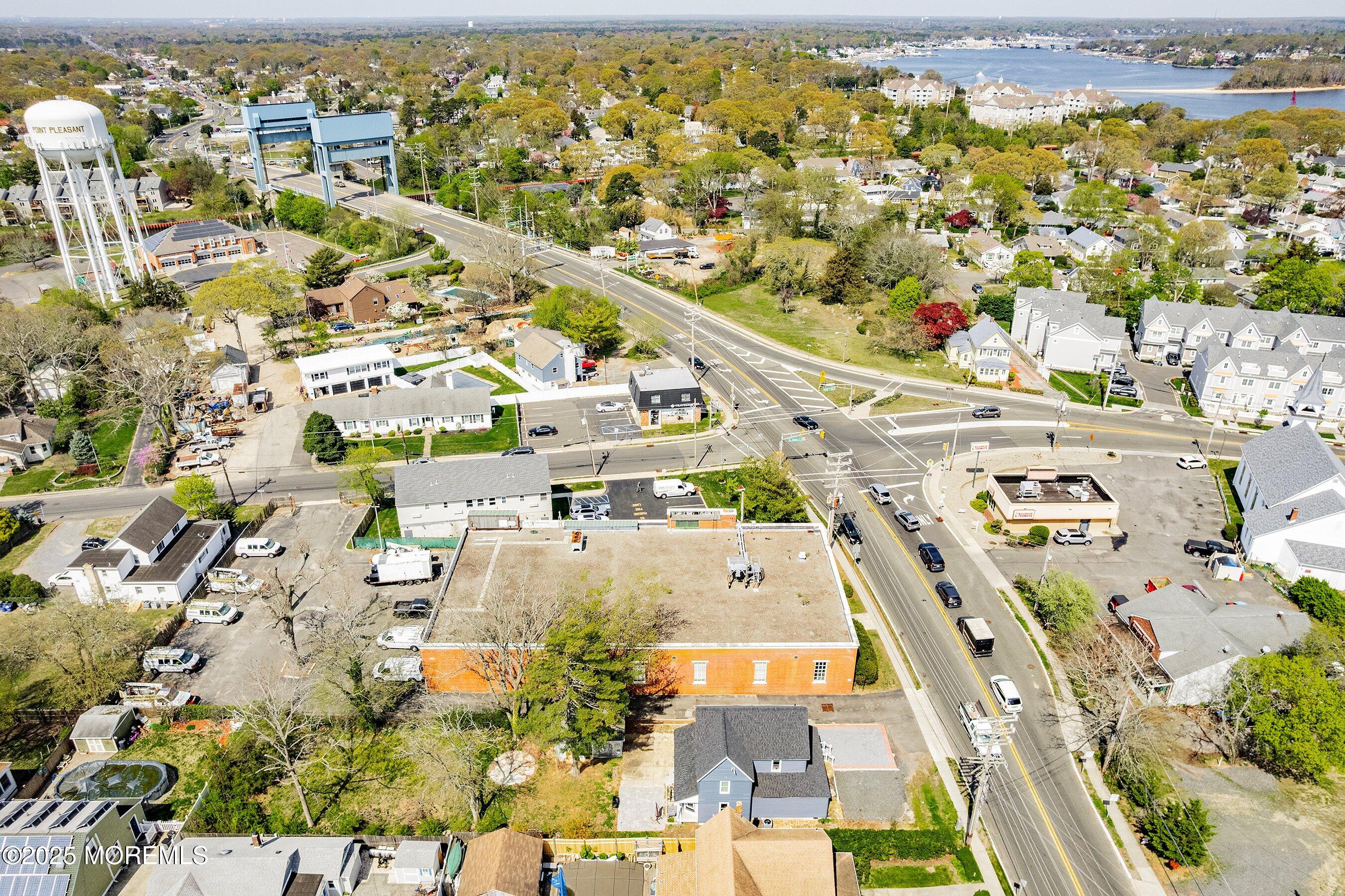 1030 Ocean Road Point Pleasant, NJ 08742 - Photo 32 of 45 an aerial view of residential houses with outdoor space
