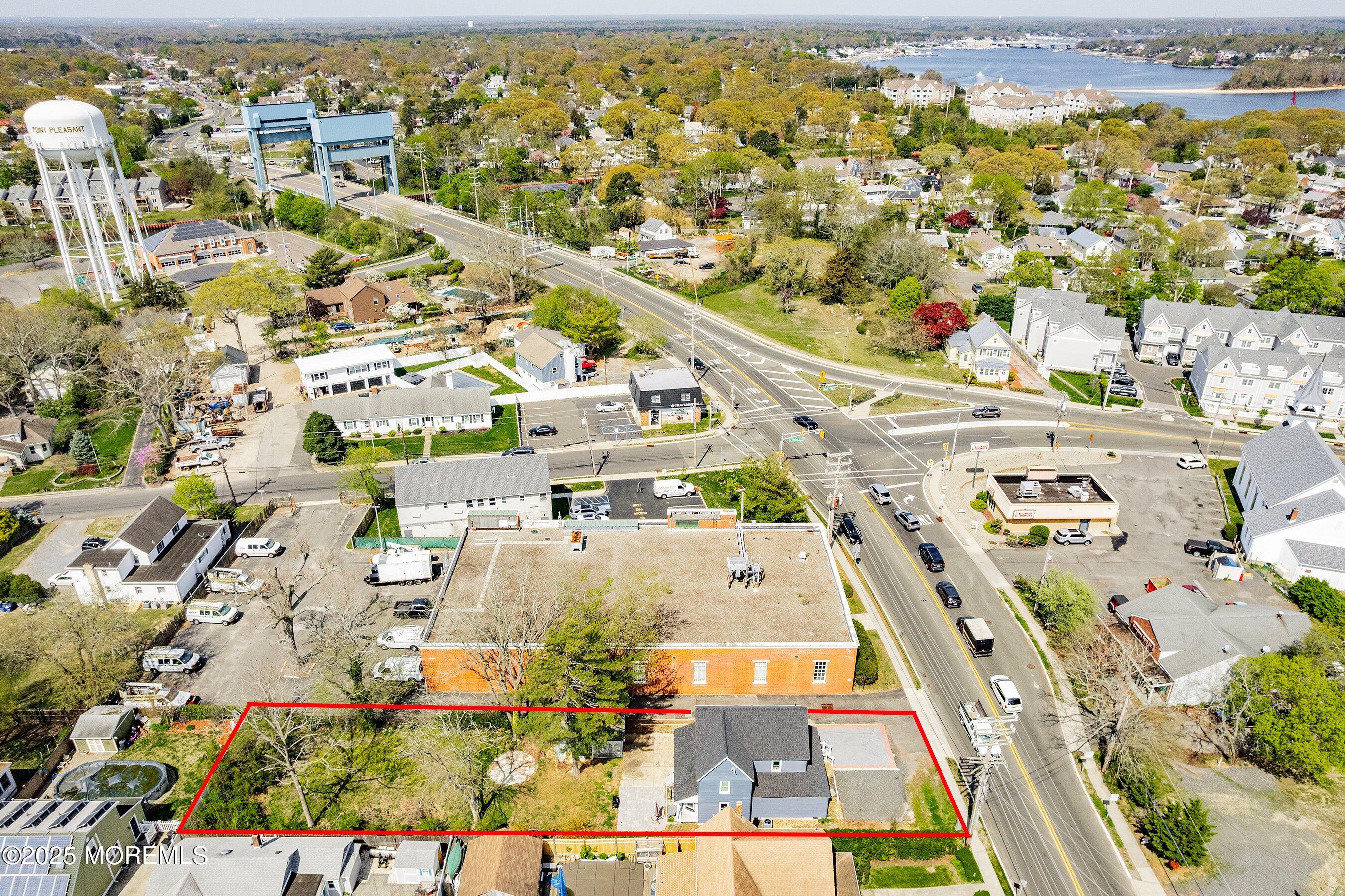 1030 Ocean Road Point Pleasant, NJ 08742 - Photo 33 of 45 an aerial view of residential houses with outdoor space