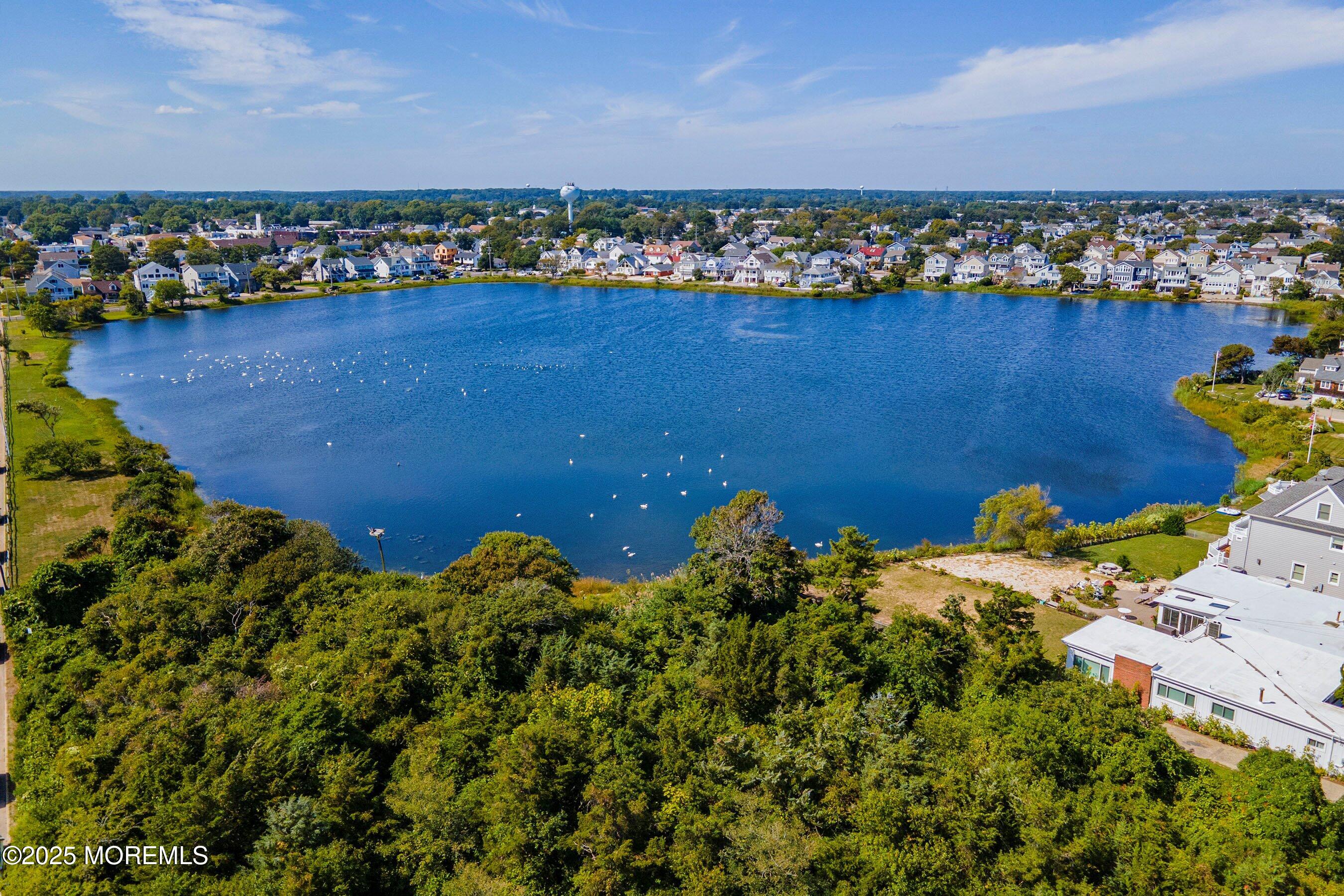 1030 Ocean Road Point Pleasant, NJ 08742 - Photo 36 of 45 an aerial view of a houses with a lake view