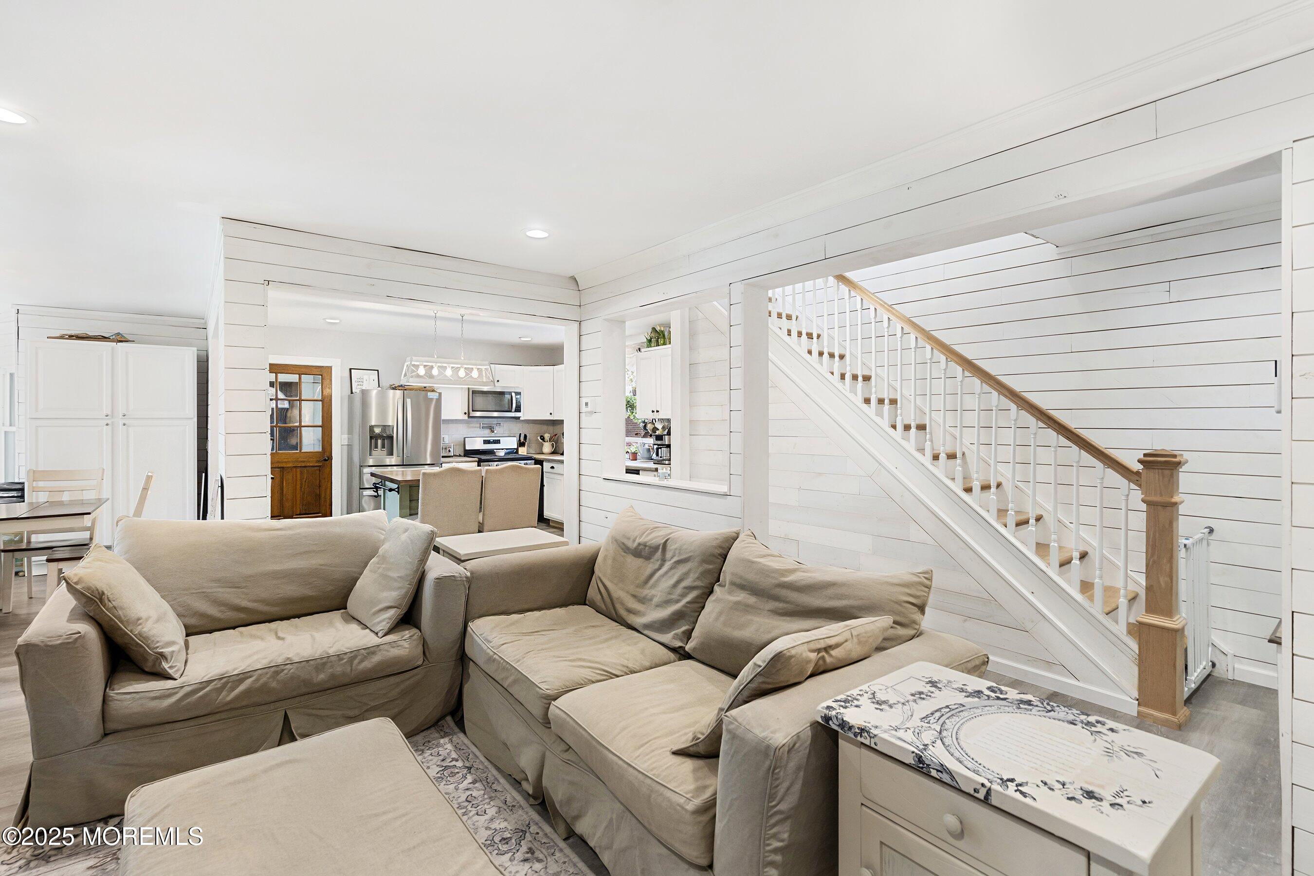 1030 Ocean Road Point Pleasant, NJ 08742 - Photo 7 of 45 a living room with furniture and a large window