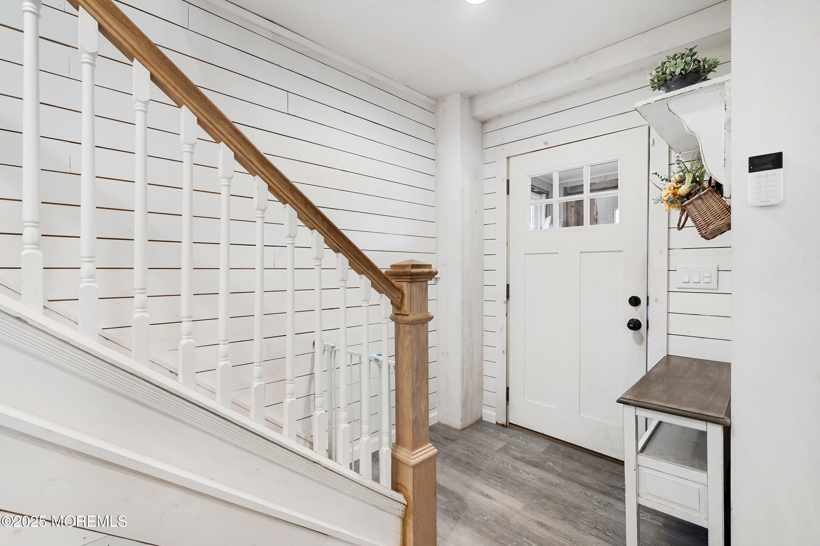 1030 Ocean Road Point Pleasant, NJ 08742 - Photo 8 of 45 a view of wooden floor and staircase