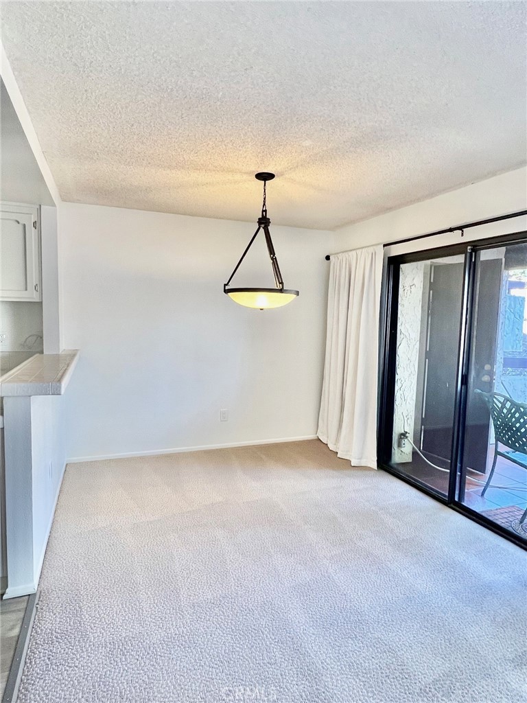 35 Cabrillo Drive Avalon, CA 90704 - Photo 13 of 40 a view of an empty room with glass door
