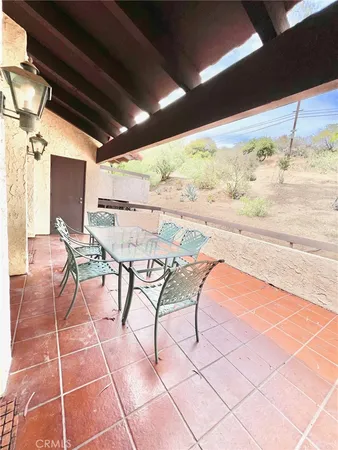 a view of an outdoor space with seating area