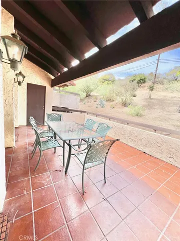 a view of an outdoor space with seating area