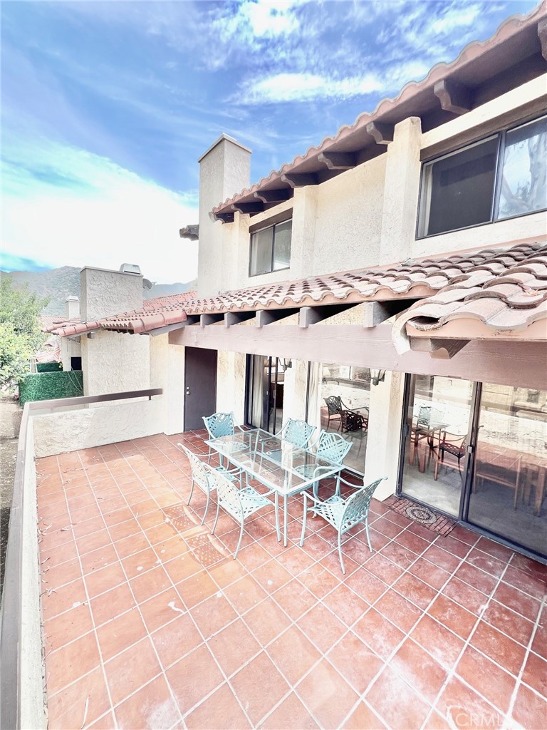 35 Cabrillo Drive Avalon, CA 90704 - Photo 17 of 40 a living room with stainless steel appliances kitchen island granite countertop furniture and a fireplace