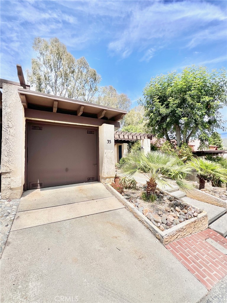 35 Cabrillo Drive Avalon, CA 90704 - Photo 37 of 40 a front view of a house with a yard