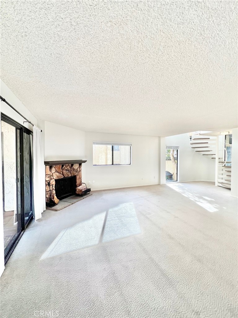 35 Cabrillo Drive Avalon, CA 90704 - Photo 9 of 40 a view of a livingroom with furniture and a fireplace