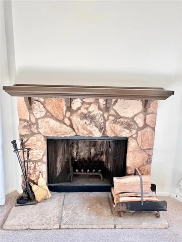 a living room with furniture a window and couch