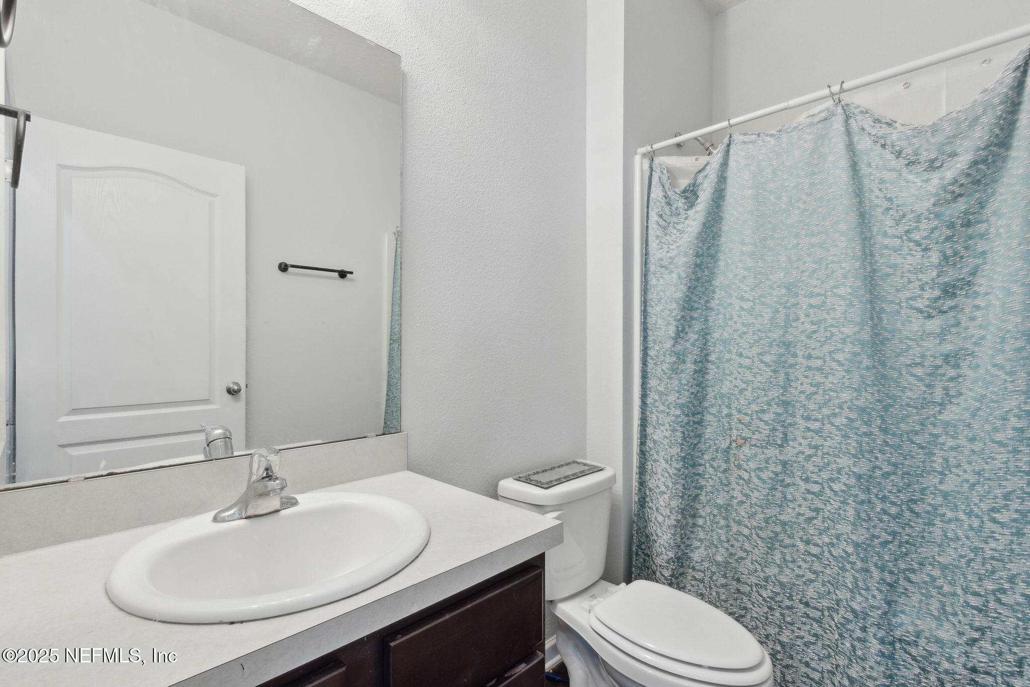 2487 Beachview Drive Jacksonville, FL 32218 - Photo 22 of 39 a bathroom with a sink toilet and shower