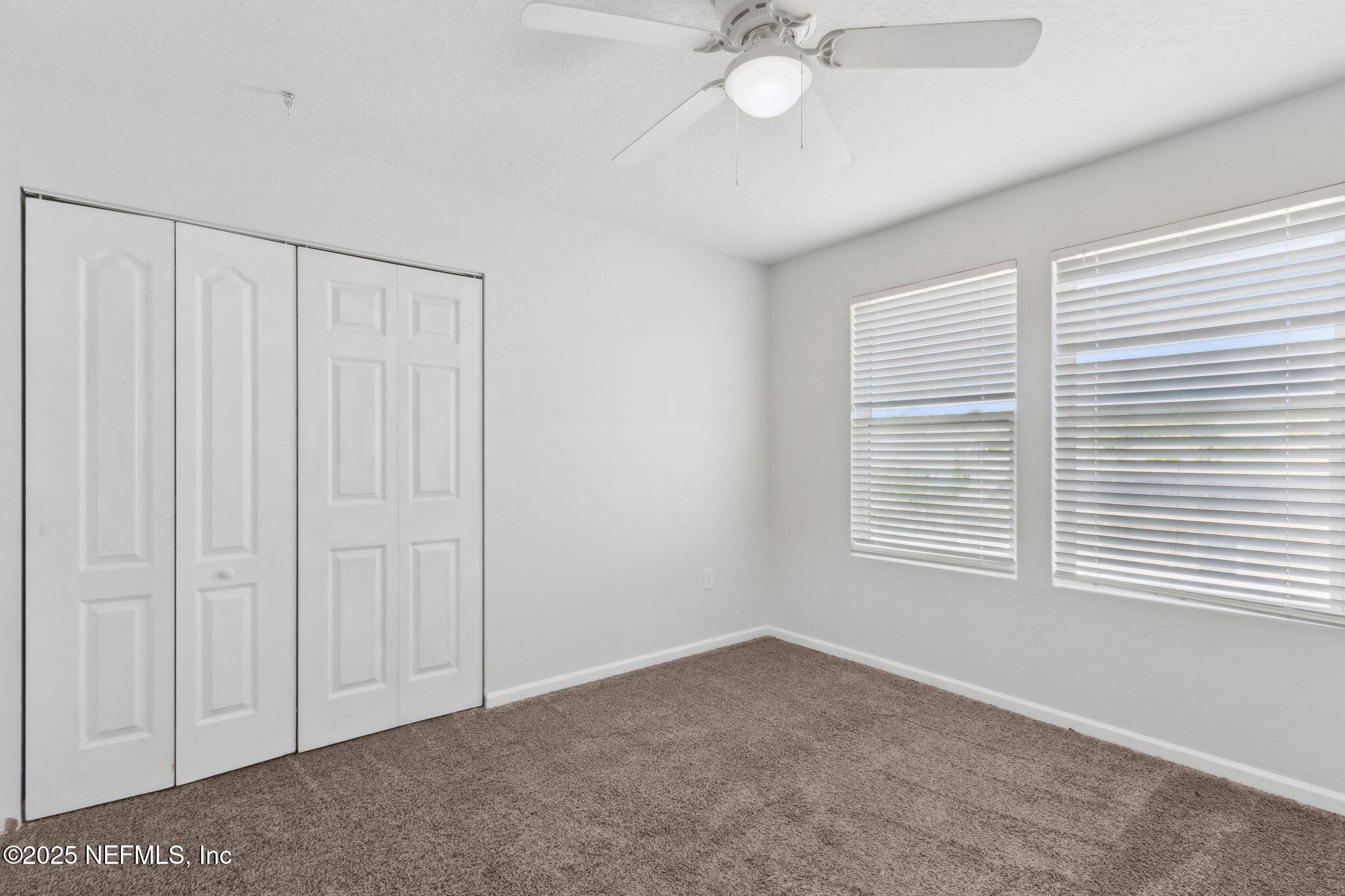 2487 Beachview Drive Jacksonville, FL 32218 - Photo 29 of 39 a view of an empty room with a window