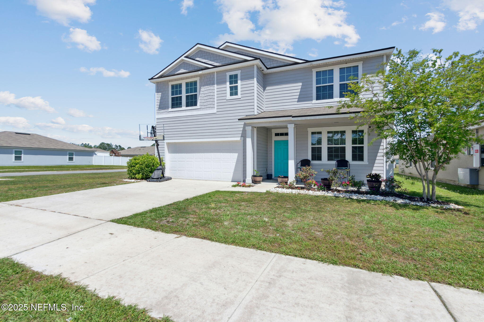 2487 Beachview Drive Jacksonville, FL 32218 - Photo 3 of 39 a view of a house with a yard and plants