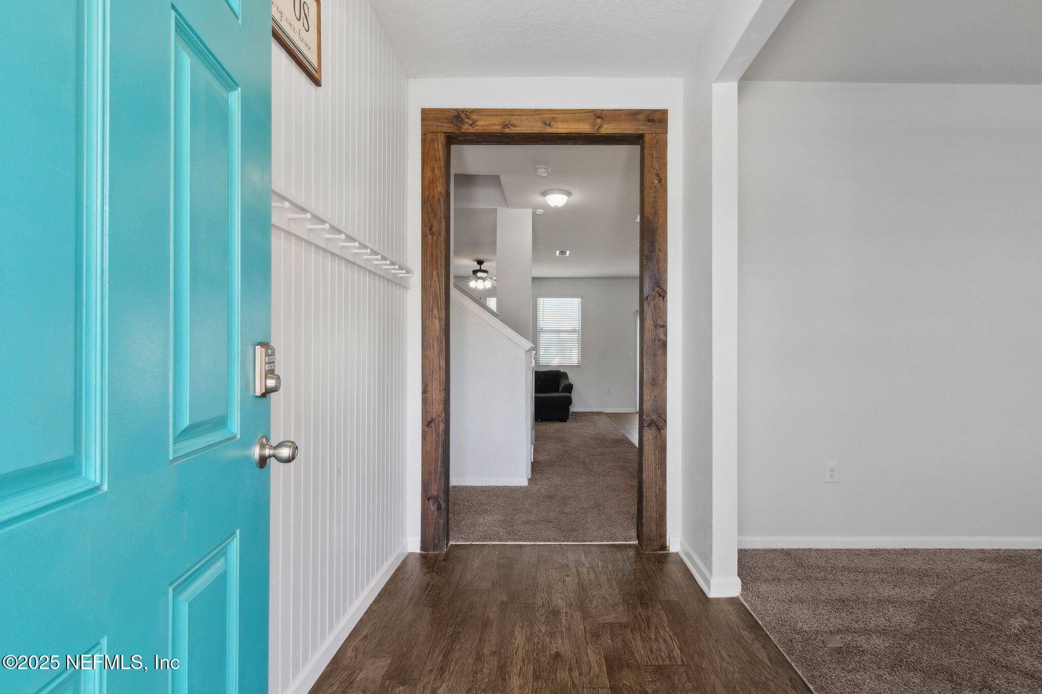2487 Beachview Drive Jacksonville, FL 32218 - Photo 7 of 39 a view of a hallway with wooden floor