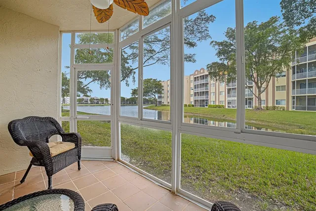 a house view with a sitting space and garden view