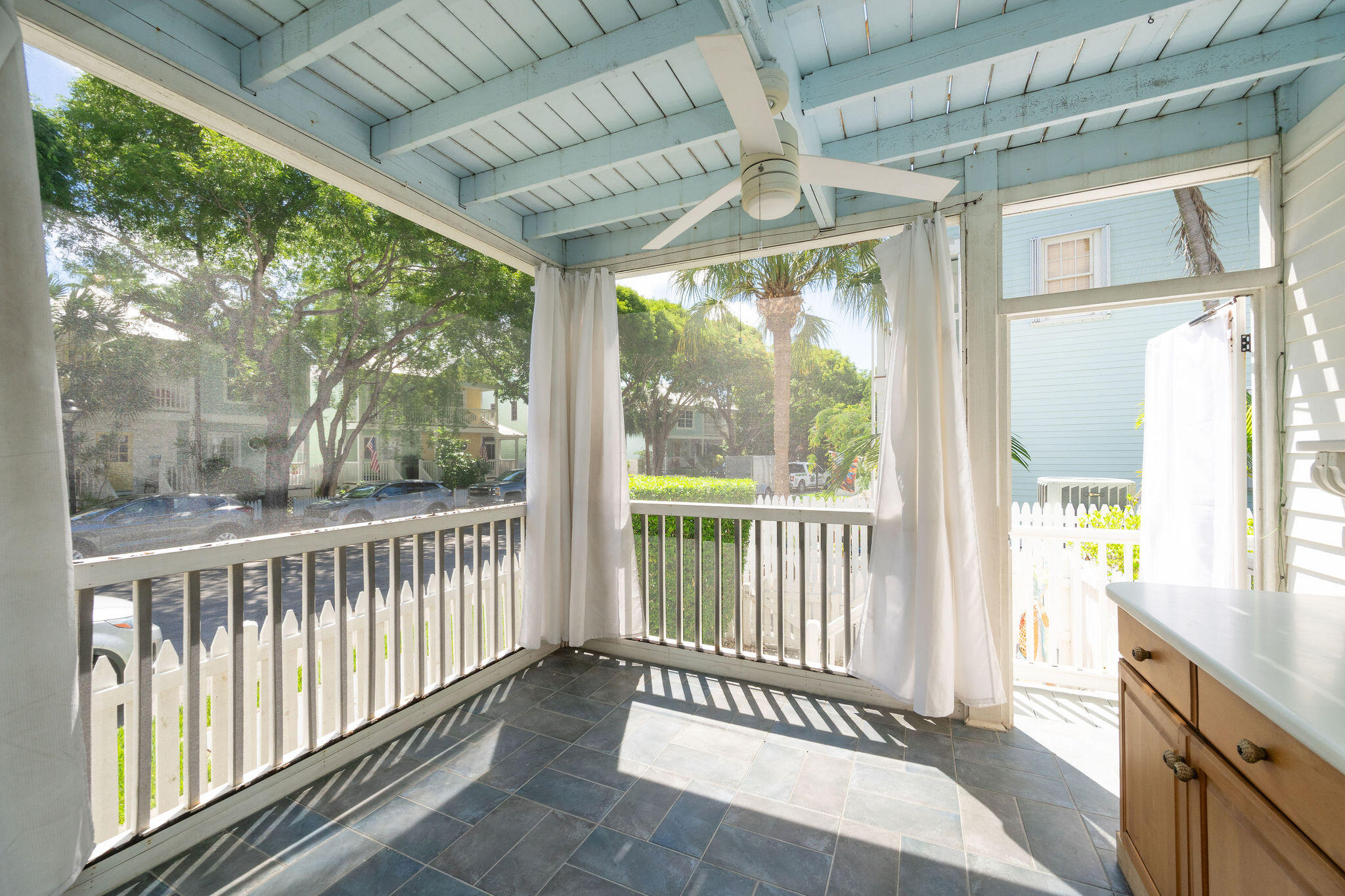 1 Spoonbill Way Key West, FL 33040 - Photo 9 of 38 a view of a porch with wooden floor and outdoor space