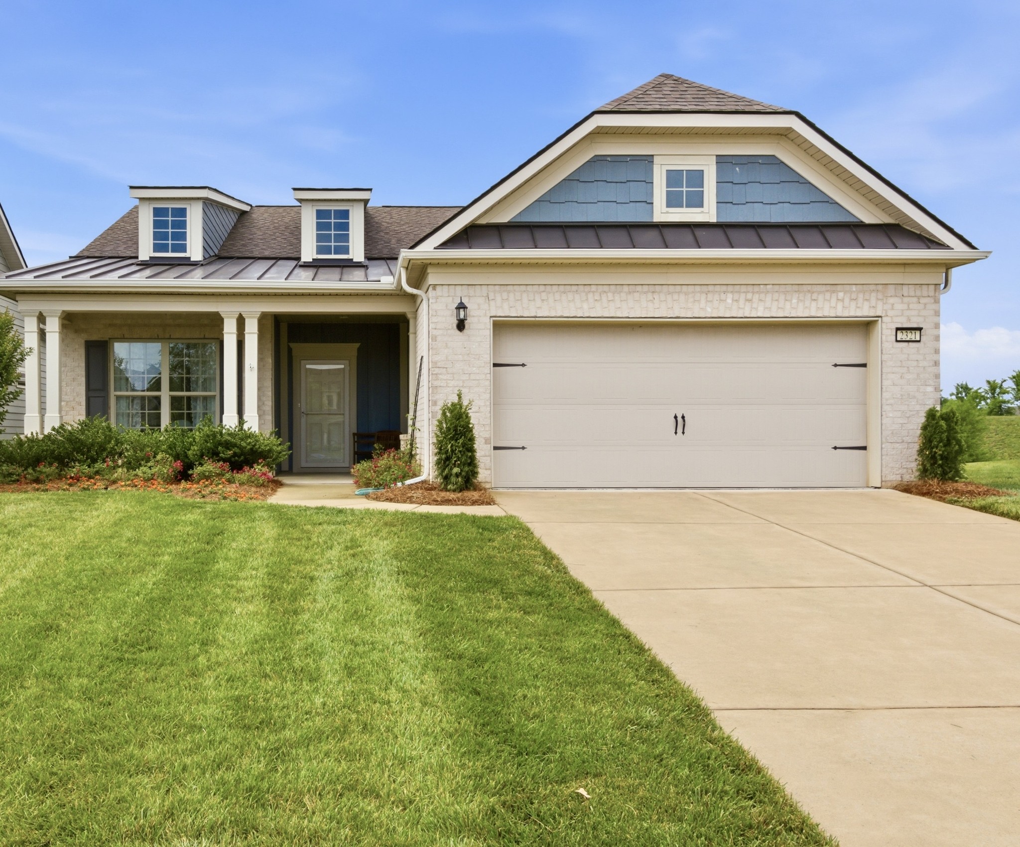2321 Lawrence Ridge Spring Hill, TN 37174 - Photo 1 of 59 a front view of a house with yard