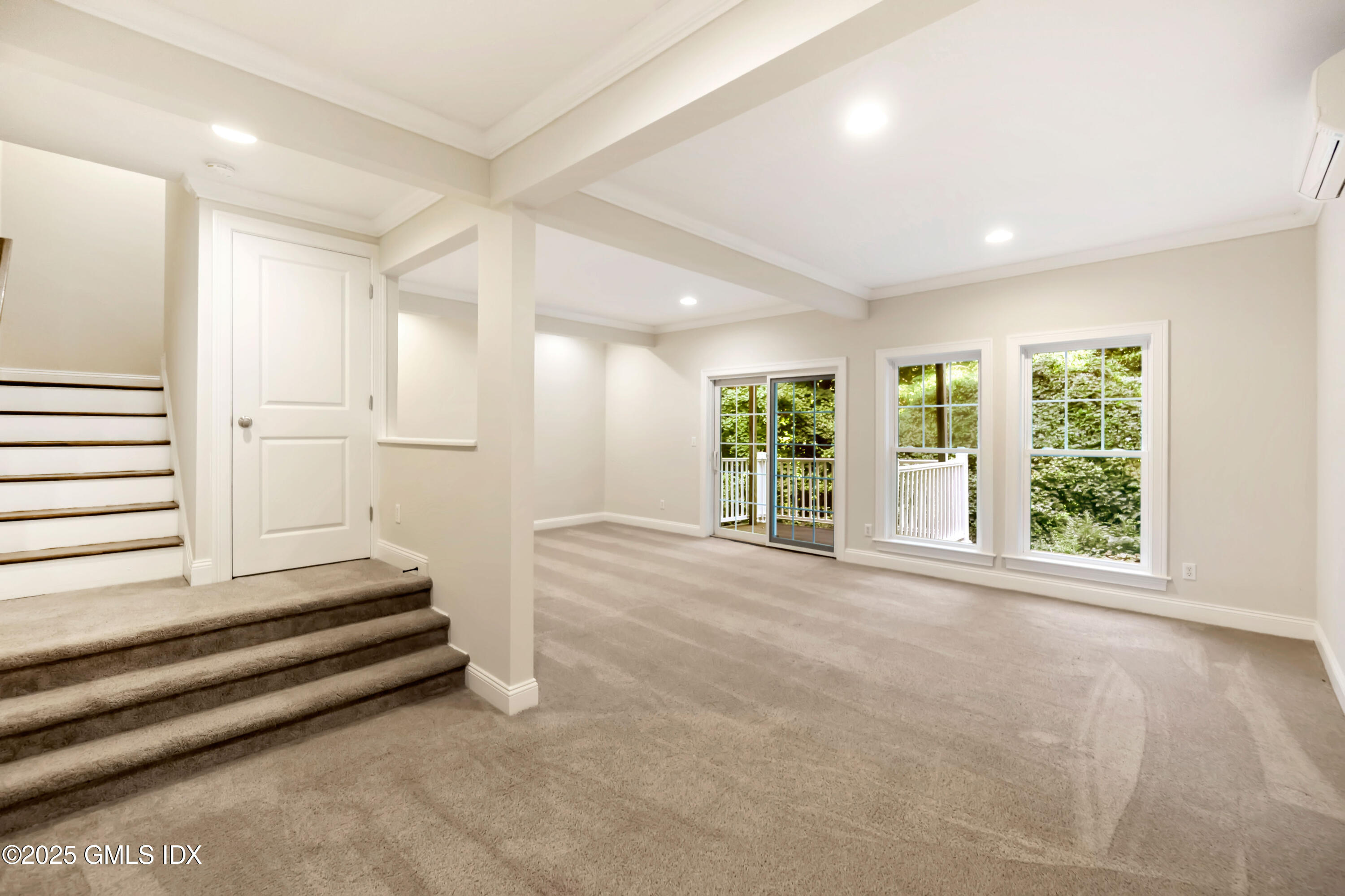 221 Weaver Street, Unit 19C Greenwich, CT 06831 - Photo 12 of 23 a view of an empty room with a window