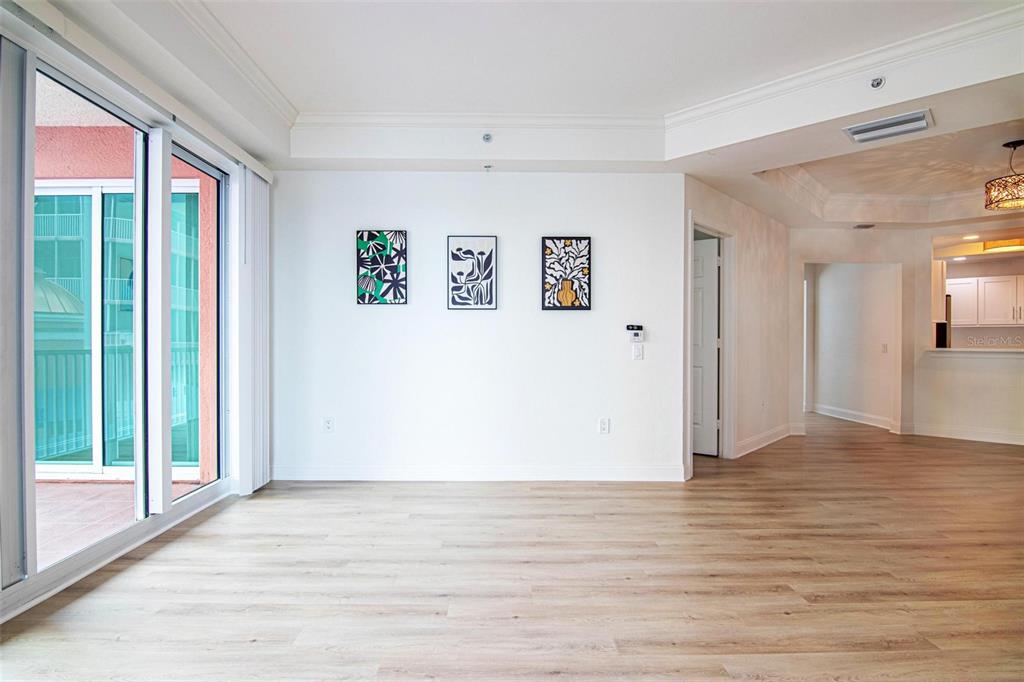 2743 First Street, Unit 406 Fort Myers, FL 33916 - Photo 22 of 52 a view of a big room with wooden floor and windows