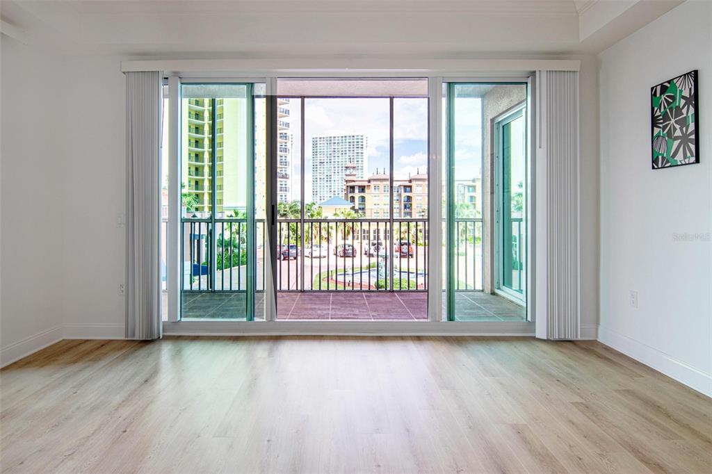 2743 First Street, Unit 406 Fort Myers, FL 33916 - Photo 23 of 52 a view of a room with wooden floor and a window