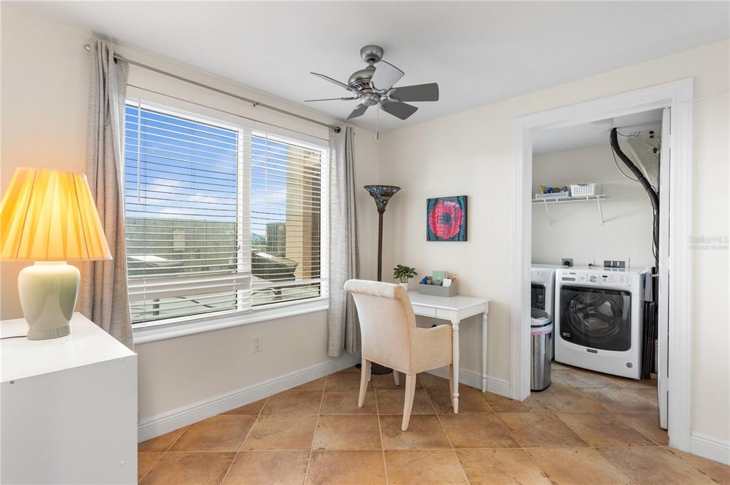 2743 First Street, Unit 406 Fort Myers, FL 33916 - Photo 29 of 52 a living room with furniture and a window