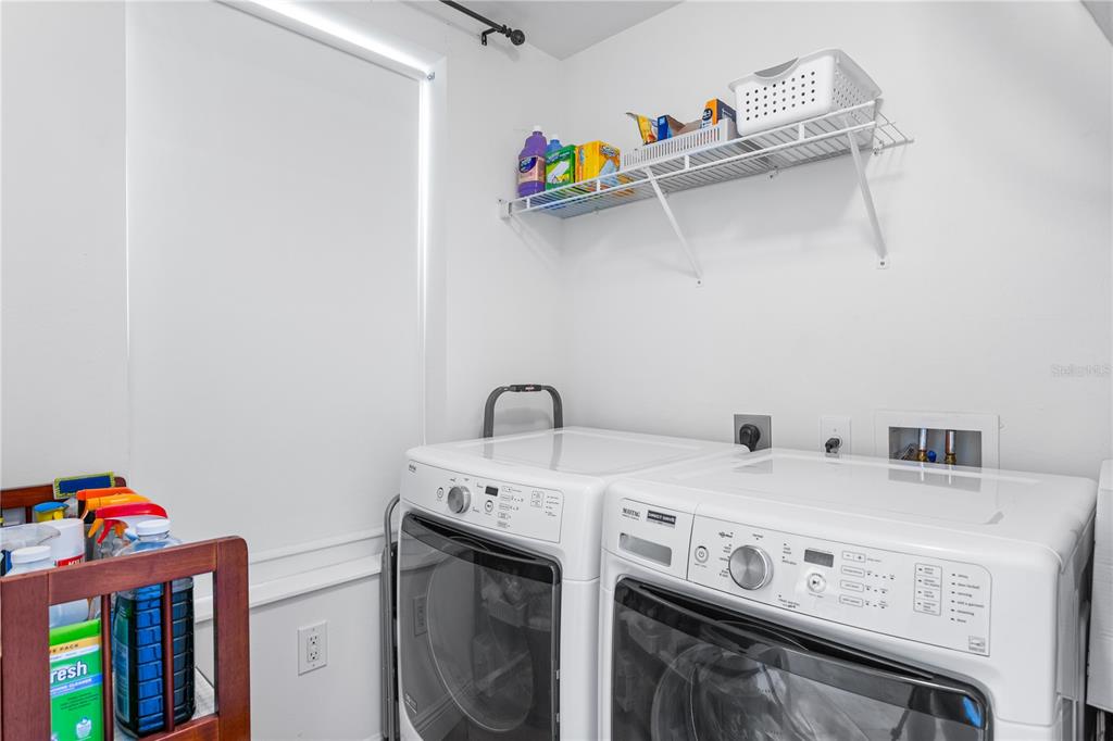 2743 First Street, Unit 406 Fort Myers, FL 33916 - Photo 31 of 52 a utility room with dryer and washer