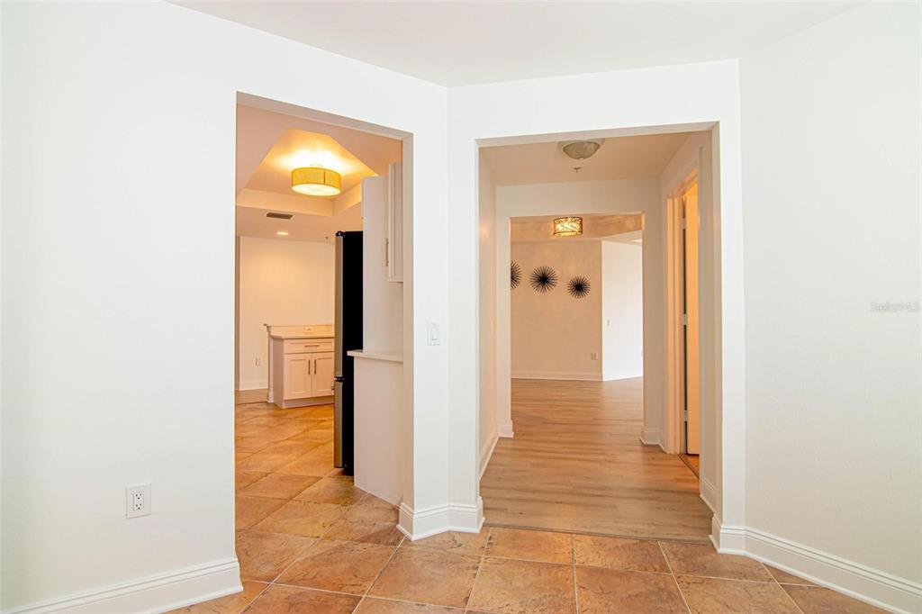 2743 First Street, Unit 406 Fort Myers, FL 33916 - Photo 33 of 52 a view of a hallway with a glass door and a window