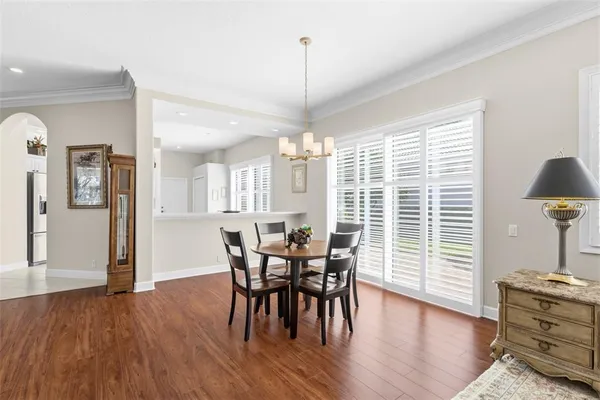 a kitchen with cabinets and stainless steel appliances