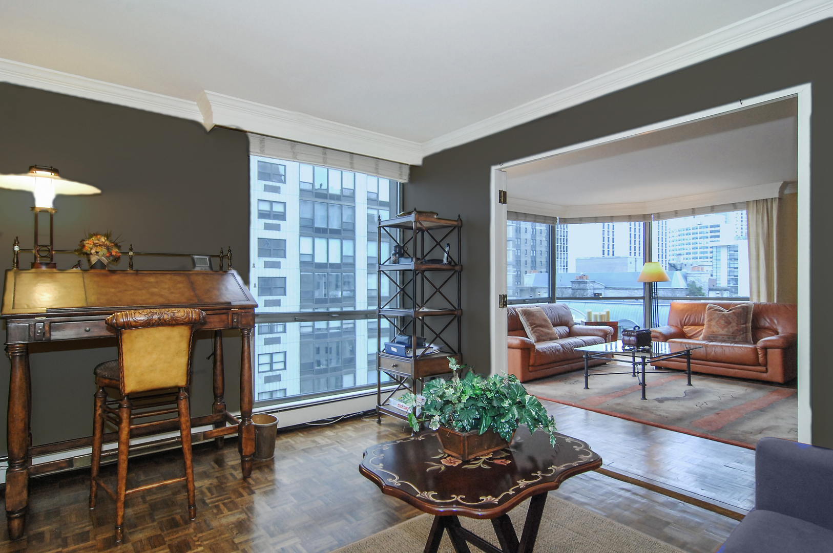 1310 North Ritchie Court, Unit 14C Chicago, IL 60610 - Photo 17 of 22 a living room with furniture and a potted plant