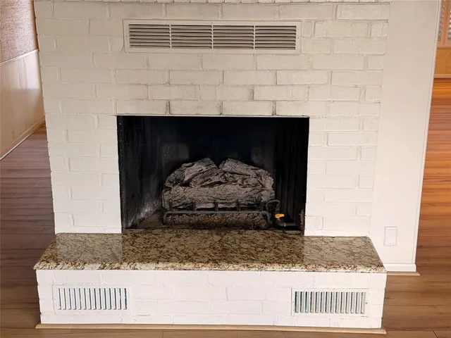 a living room with a fireplace