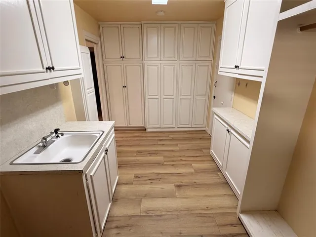 a bathroom with 2 sink and a mirror