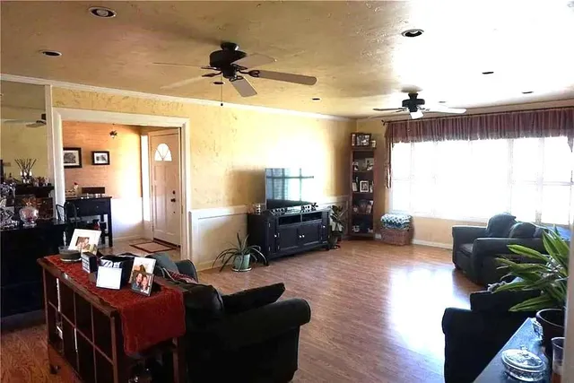 a bed room with a bed and a lamp